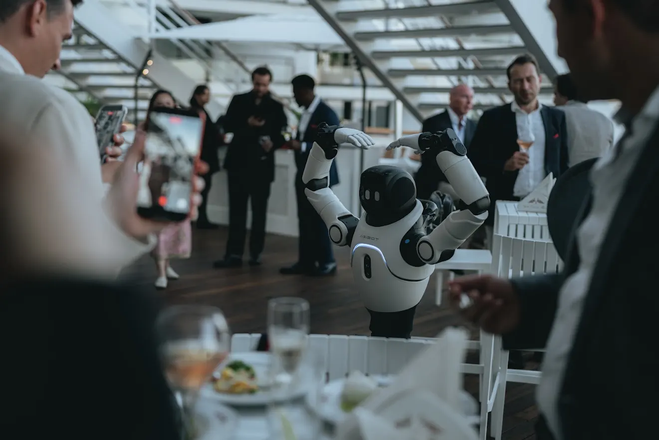 Robot entertaining guests aboard a yacht at Monaco Robot Show